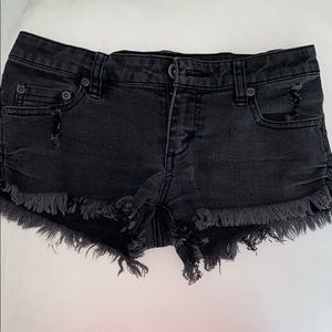 Black distressed shorts